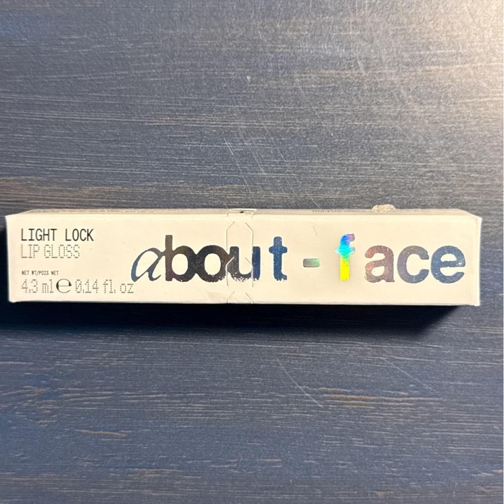 about-face Light Lock Lip Gloss - Angel on Fire